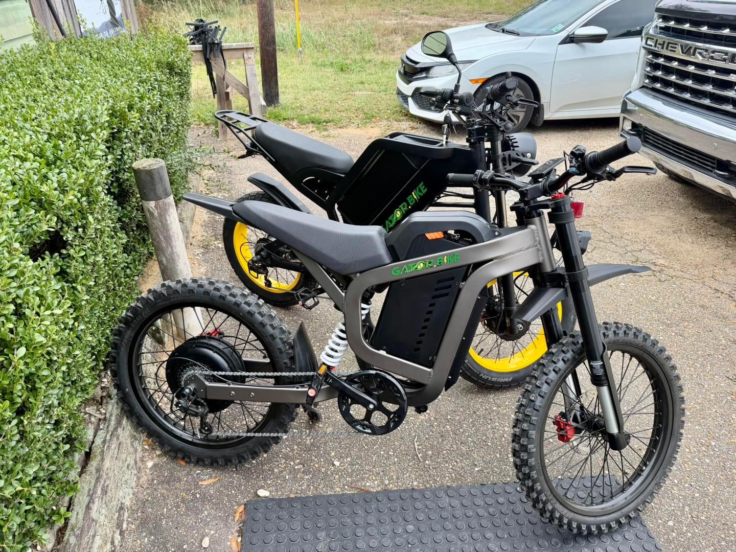Fat-tire electric bikes parked outside the store